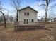 Home features a deck overlooking a spacious backyard at 209 Vermont Dr, Stanley, NC 28164