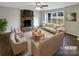 Spacious living room featuring a stone fireplace and large windows at 209 Vermont Dr, Stanley, NC 28164