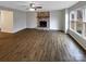 Living room with hardwood floors and a stone fireplace at 209 Vermont Dr, Stanley, NC 28164