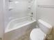 Clean bathroom with bathtub and toilet at 2219 Lochview St, Pineville, NC 28134