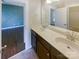 Bathroom with double vanity and view of bedroom at 2219 Lochview St, Pineville, NC 28134