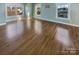 Hardwood floors and multiple windows in this bright bedroom at 2219 Lochview St, Pineville, NC 28134