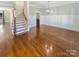 Formal dining room with hardwood floors and staircase at 2219 Lochview St, Pineville, NC 28134