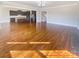 Spacious living room with hardwood floors and open concept at 2219 Lochview St, Pineville, NC 28134