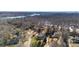 Aerial view of house and neighborhood, near water at 320 Belwood Dr, Belmont, NC 28012