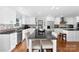 Modern white kitchen with granite countertops and stainless steel appliances at 320 Belwood Dr, Belmont, NC 28012