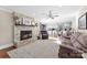 Cozy living room with stone fireplace and hardwood floors at 320 Belwood Dr, Belmont, NC 28012