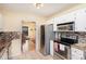 Galley kitchen with stainless steel appliances at 3219 Monte Dr, Monroe, NC 28110