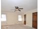 Bedroom with carpet flooring, ceiling fan, and natural light from window at 3303 Reid Cir, Monroe, NC 28112