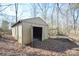 Exterior shot of a single-story storage shed located in the backyard at 3303 Reid Cir, Monroe, NC 28112