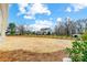 Spacious, well-manicured backyard with distant view of the main house at 3428 Greene Rd, Monroe, NC 28110