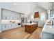 Spacious kitchen featuring an island, white countertops, stainless steel appliances, and ample cabinet storage at 3428 Greene Rd, Monroe, NC 28110