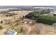 Aerial view of house and surrounding land at 36190 Millingport Rd, New London, NC 28127