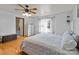 Spacious bedroom with hardwood floors and large windows at 36190 Millingport Rd, New London, NC 28127