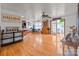 Open living space with hardwood floors and a view of the kitchen at 36190 Millingport Rd, New London, NC 28127