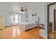 Spacious main bedroom with hardwood floors and large windows at 36190 Millingport Rd, New London, NC 28127