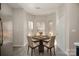 Cozy dining area with a round table and four chairs near the kitchen at 3821 Bullard St, Charlotte, NC 28208