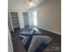 Bedroom with dark wood floors and blue rug at 4066 Triton Dr, Fort Mill, SC 29708