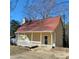 House exterior featuring a yellow facade and red roof at 4066 Triton Dr, Tega Cay, SC 29708