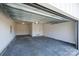 Spacious garage with open overhead door and concrete floor at 4827 Brookridge Ne Dr # 388, Hickory, NC 28601