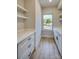 Bright pantry with white cabinets, quartz countertops, and ample shelving at 4827 Brookridge Ne Dr, Hickory, NC 28601