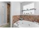 Bathroom with soaking tub and walk-in shower at 489 Maple Ridge Cir, Salisbury, NC 28147