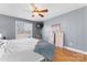 Well-lit bedroom featuring wood floors and window at 489 Maple Ridge Cir, Salisbury, NC 28147