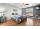 Bright bedroom with wood floors and large window at 489 Maple Ridge Cir, Salisbury, NC 28147