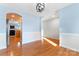 Bright dining room with hardwood floors and view of kitchen at 489 Maple Ridge Cir, Salisbury, NC 28147