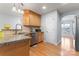 Kitchen features stainless steel appliances and light wood cabinets at 489 Maple Ridge Cir, Salisbury, NC 28147