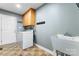 Laundry room with washer, dryer, cabinets, and utility sink at 489 Maple Ridge Cir, Salisbury, NC 28147