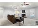 Open living room with fireplace and view to kitchen at 489 Maple Ridge Cir, Salisbury, NC 28147