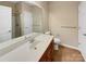 Clean bathroom with single vanity and shower/tub combo at 5573 Prosperity View Dr, Charlotte, NC 28269