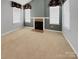 Large bedroom with fireplace and neutral wall colors at 5573 Prosperity View Dr, Charlotte, NC 28269