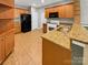 Well-equipped kitchen with granite counters and wood cabinets at 5573 Prosperity View Dr, Charlotte, NC 28269