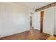 Simple bedroom with wood floors and closet at 604 E Louisiana Ave, Bessemer City, NC 28016