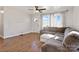 Living room with L-shaped sofa and hardwood floors at 604 E Louisiana Ave, Bessemer City, NC 28016