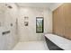 Contemporary bathroom features a soaking tub, walk-in shower and sleek design elements at 6133 Berryhill Towns Dr, Charlotte, NC 28270