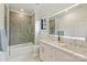 Bathroom with a shower-tub combo, double vanity, and modern lighting at 6133 Berryhill Towns Dr, Charlotte, NC 28270