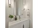 Modern powder room featuring a white vanity and stylish accents at 6133 Berryhill Towns Dr, Charlotte, NC 28270