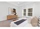 Main bedroom with large windows and a cozy atmosphere at 681 Journey Sw St, Concord, NC 28025