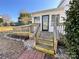 Back porch and deck lead to door, offering easy access to the backyard at 7860 Georgia Ave, Kannapolis, NC 28081