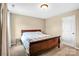 Bedroom with beige walls, carpeted floor, and a window with curtain providing natural light at 79031 Ridgehaven Rd, Lancaster, SC 29720