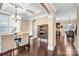 Formal dining room boasts hardwood floors, coffered ceilings, and an elegant chandelier at 79031 Ridgehaven Rd, Lancaster, SC 29720