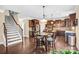 Kitchen featuring stainless appliances, a granite island, and steps leading to another level at 79031 Ridgehaven Rd, Lancaster, SC 29720