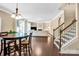 An open living room with stairs, hardwood floors and natural light at 79031 Ridgehaven Rd, Lancaster, SC 29720