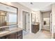 Spacious main bathroom with double vanity, granite countertops, and tiled floor and enclosed tiled shower at 79031 Ridgehaven Rd, Lancaster, SC 29720