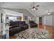 Inviting living room featuring hardwood floors, vaulted ceilings, and access to the kitchen at 849 Treva Anne Sw Dr, Concord, NC 28027