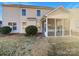 Backyard with a screened porch and grassy area at 8835 Merrie Rose Ave, Charlotte, NC 28213