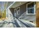 Covered back patio with gray siding and a concrete slab at 100 Howell St # 13A, Hickory, NC 28601